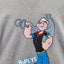 CLOSE UP OF THE POPEYE THE ANCHORMAN FULL COLOR ARTWORK 