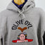 CLOSE UP OF OLIVE OYL, POPEYE'S GIRLFRIEND. THE HOODED SWEATSHIRT IS PART OF THE COLLECTION OF SCHOOLOFLIFEPROJECTS.