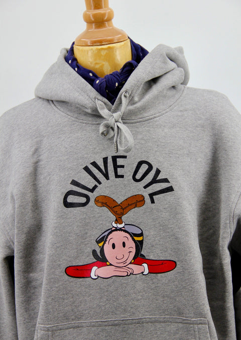 CLOSE UP OF OLIVE OYL, POPEYE'S GIRLFRIEND. THE HOODED SWEATSHIRT IS PART OF THE COLLECTION OF SCHOOLOFLIFEPROJECTS.